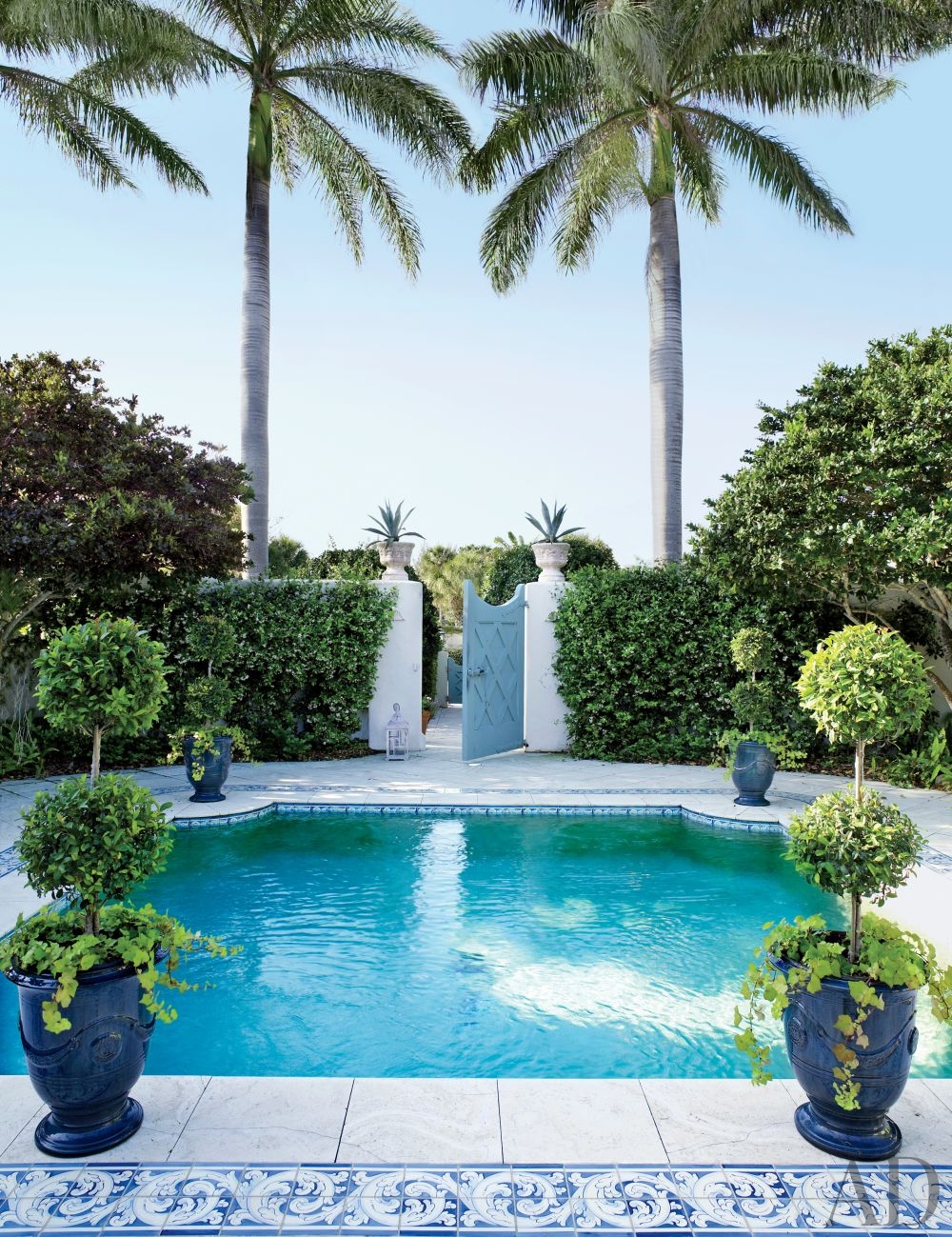 how to decorate around your pool | BetterDecoratingBible