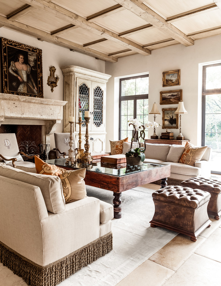 mediterranean-living-room rustic couch with fringe tufted ottomans better decorating bible blog medieval candle holders waffle beam ceiling rustic stone fireplace