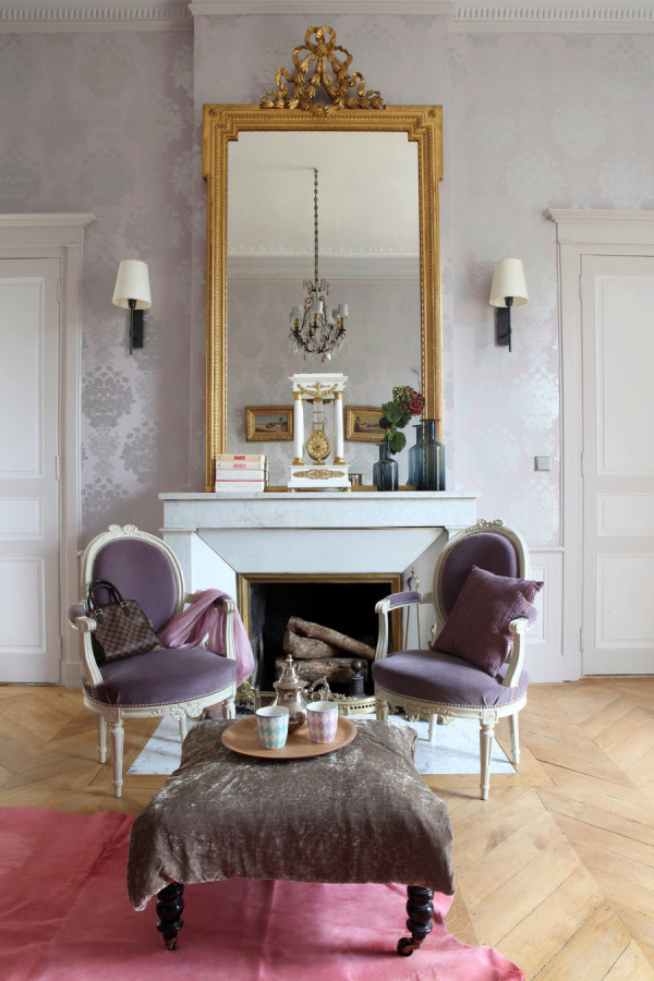 style me pretty radiant orchic gold mirorr mantel louis studded chairs gold damask wallpaper chandelier decorating