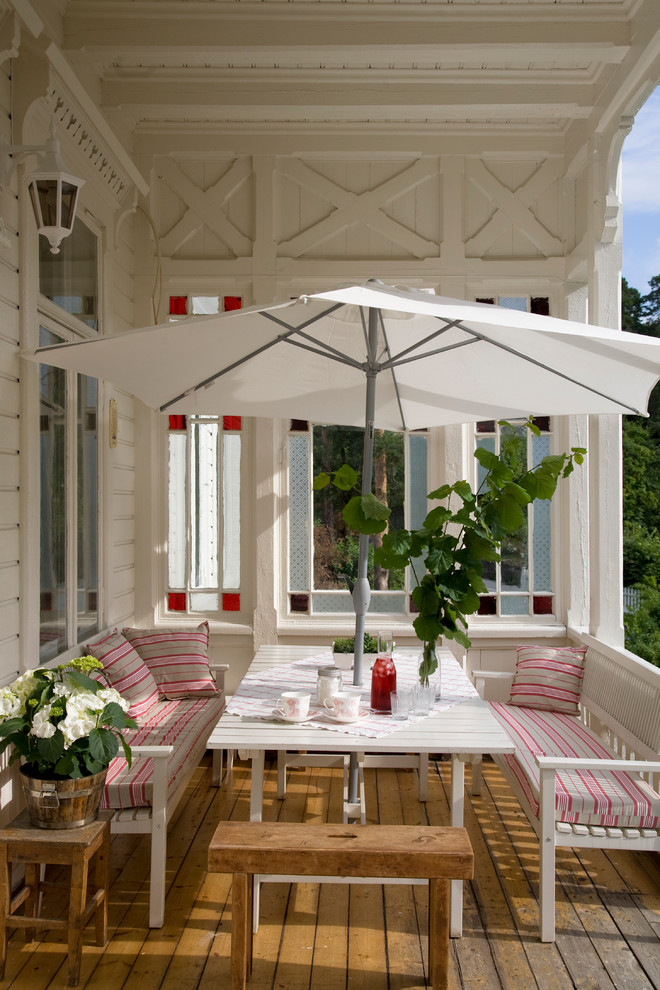 acr villa skovly outdoo balacony dining Traditional-Porch