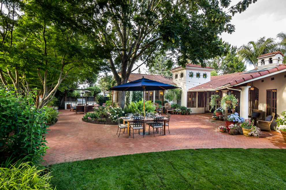 casa smith designs alfresco dining umbreall terra cotta roof better decorating bible blog red stone backyard mediterranean-Patio