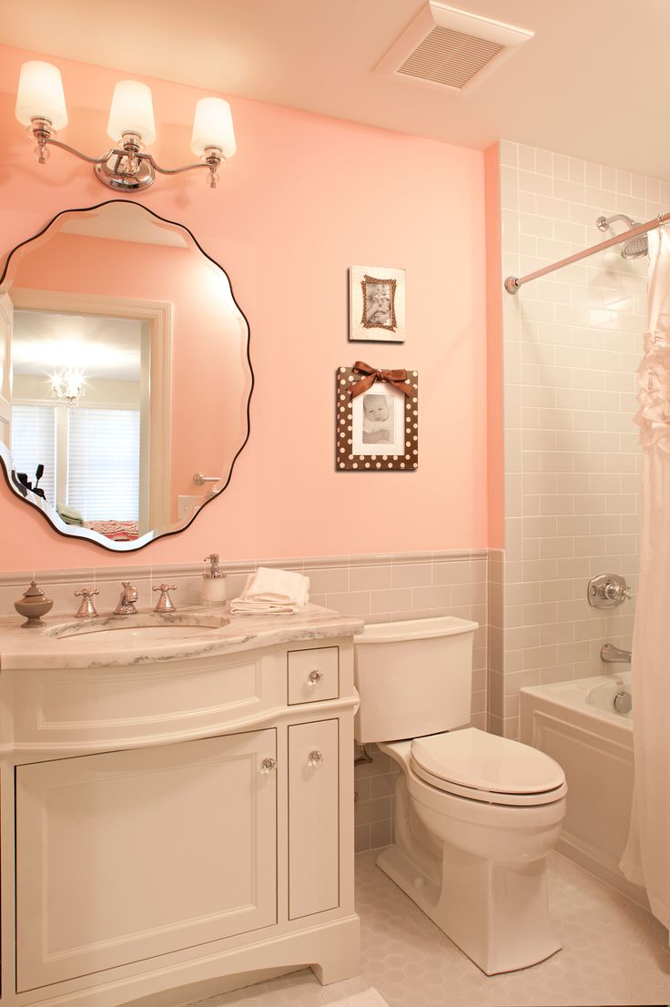 beveled mirror pink washroom gray subway tiles