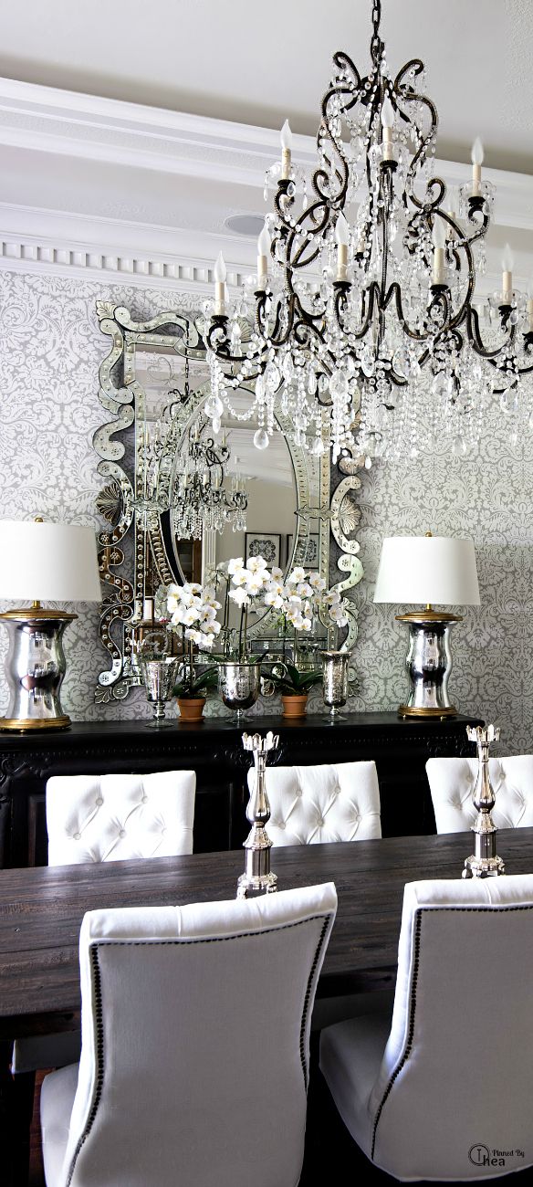 dining room chandelier damask wallpaper decorating white tufted studded chairs better decor bible silver sparkling