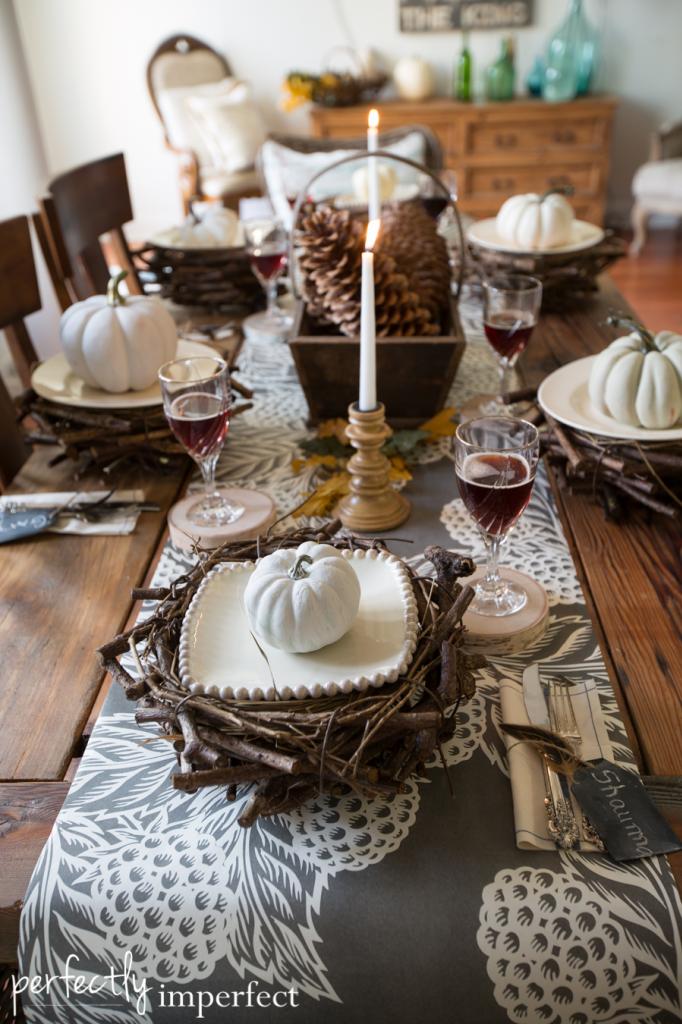 fall thanksgiving home tour tablescape centerpiece pine cones candles idea sliced wood glass place mats country style