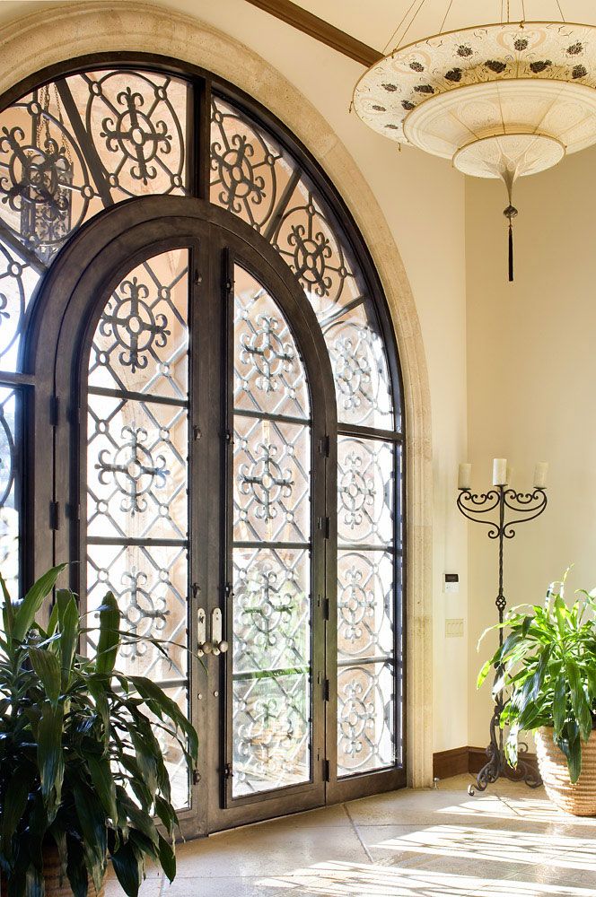 wrought iron glass front door entrance mansion