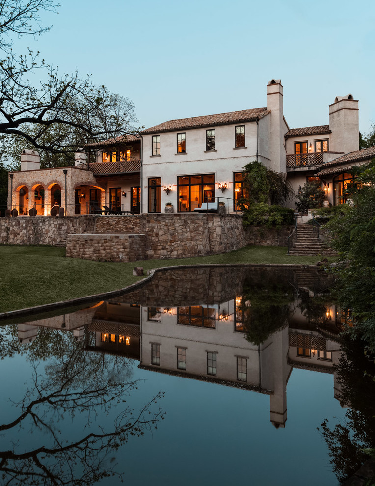 mediterranean-exterior home brick walls better decorating bible blog lake pond backyard behind house