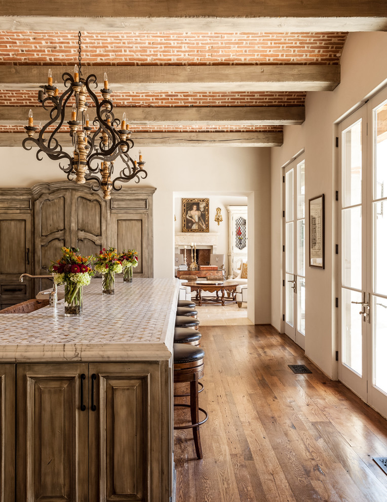 mediterranean-kitchen rustic medieval distressed wood floors brick ceiling wood beams better decorating bible blog