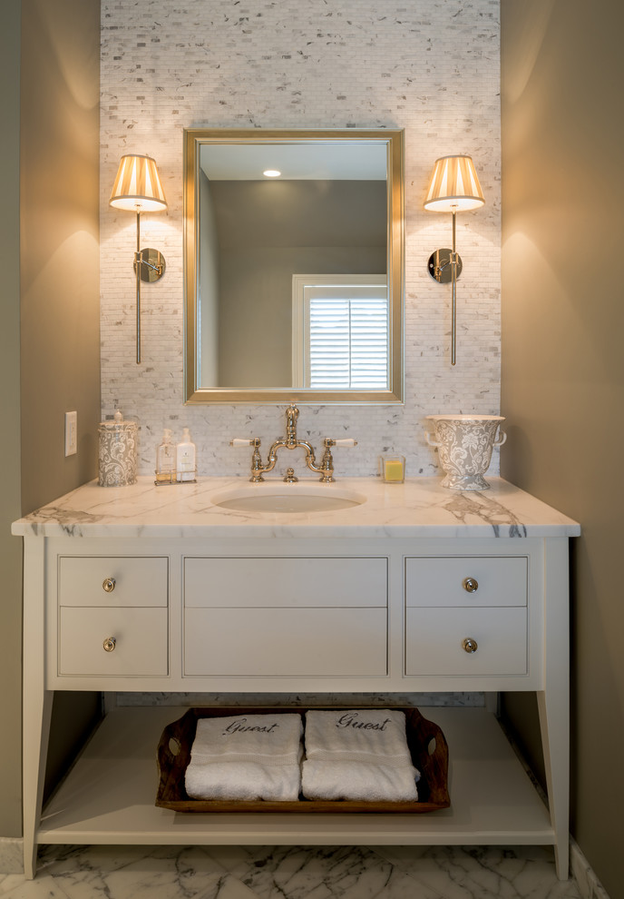 guest bathroom monogram towels better decorating bible blog luxurious marble countertop sconce lighting taupe walls