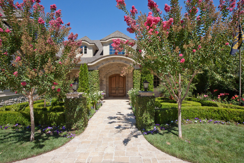 transitional-landscape flowers shrubs curb appeal walkway