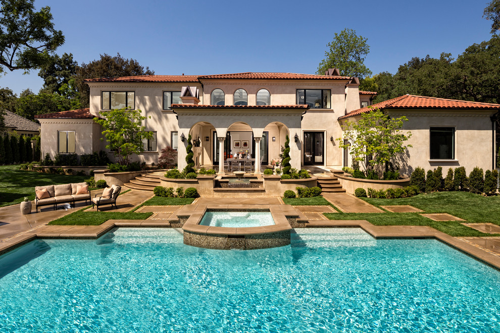 arches mediterranean-pool house california tuscany decor ideas landscaping red tiled roof