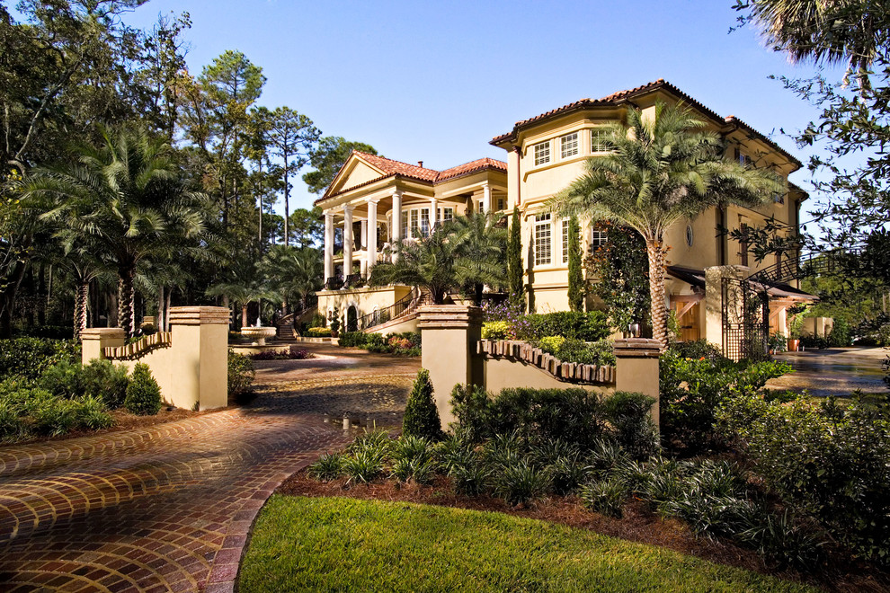 mediterranean mansions exotic palm trees driveway columns villa ideas