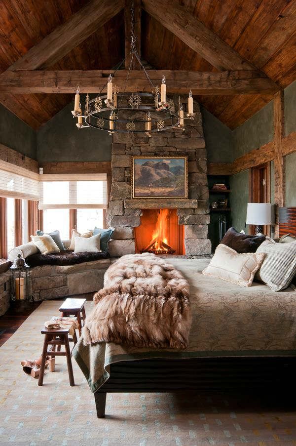 rustic cabin bedroom cozy fur decor fireplace ideas stone wooden beams