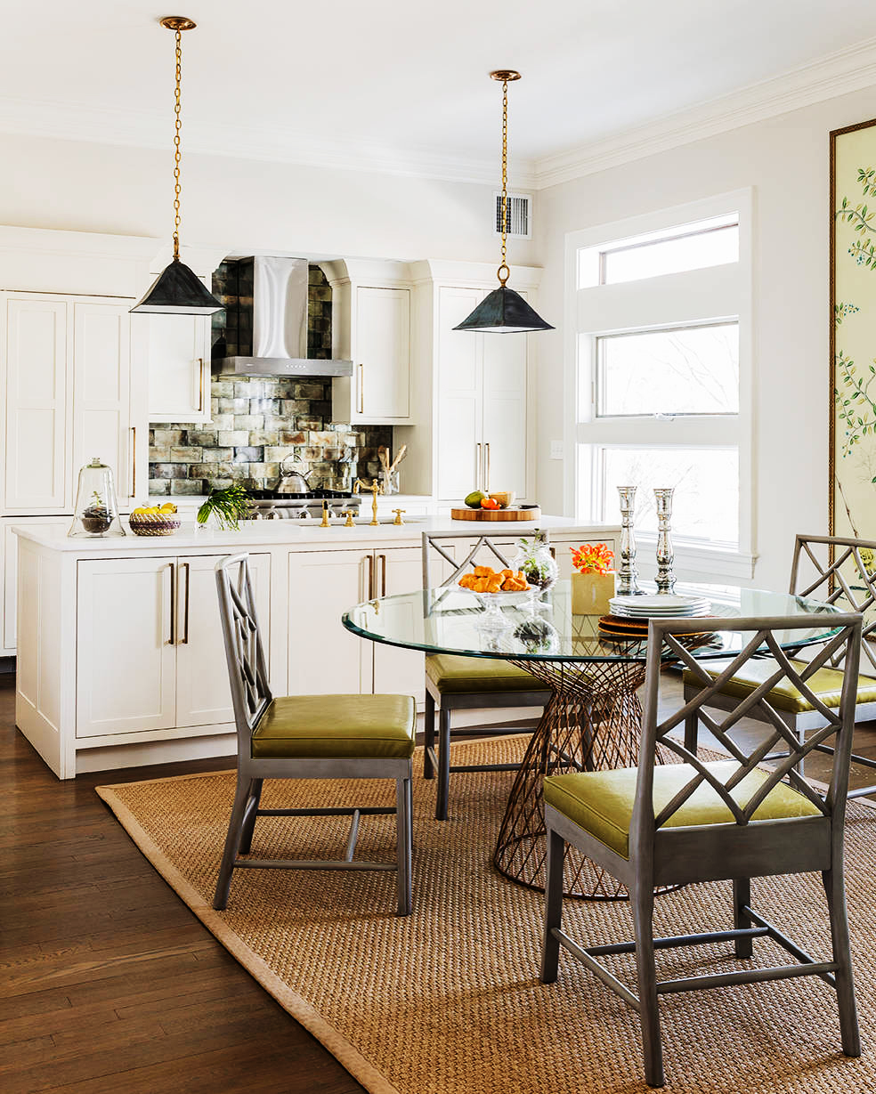 vintage chairs with modern glass dining table