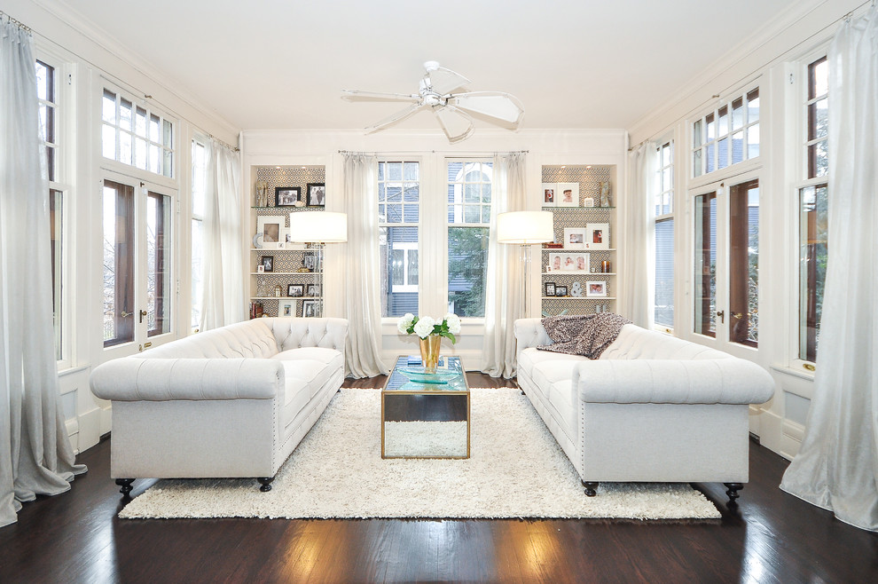 tufted cream sofa living room decor glass shelving