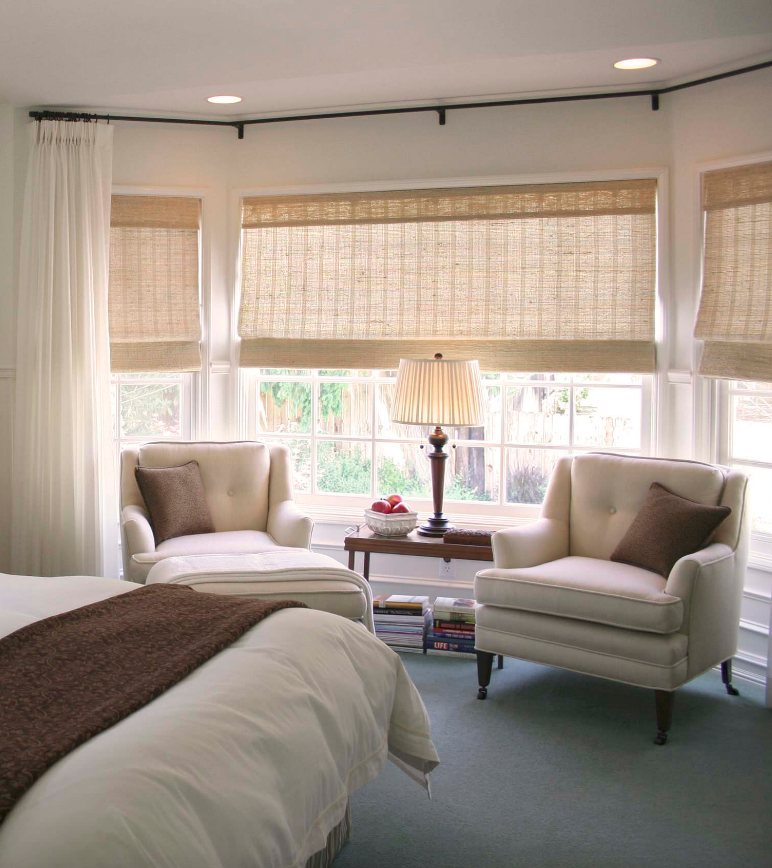 Bedroom with roman shades.