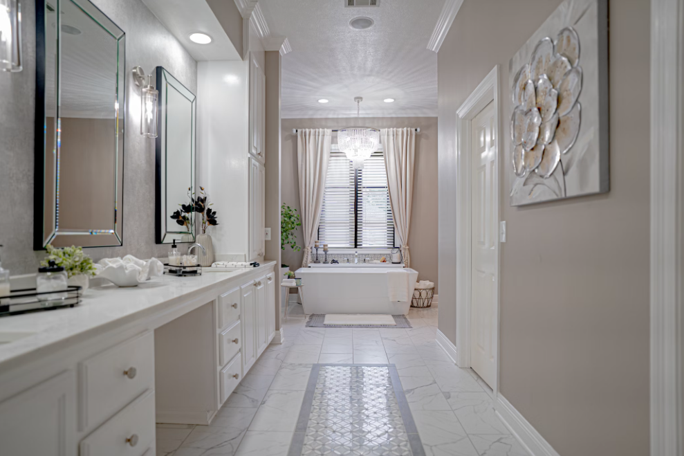 Cream bathroom with marble tiles.